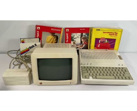 APPLE COMPUTERS - An Apple IIc Prototype computer with associated monitor, transformer, and manuals c. 1983, marked Prototype