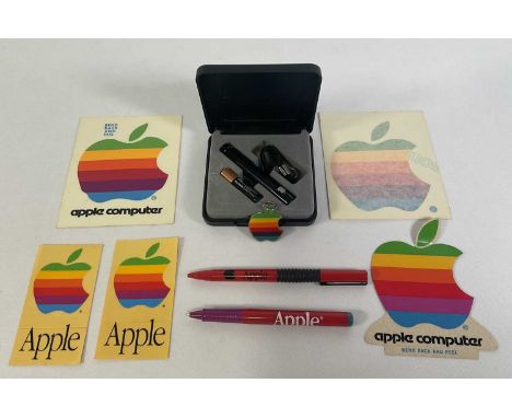 APPLE COMPUTERS- A group of vintage Apple collectibles and memorabilia including a Mag-Lite Solitaire Apple torch, unused in 