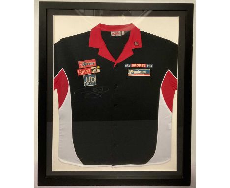 SPORTING MEMORABILIA - A framed darts shirt signed by PHIL 'THE POWER' TAYLOR, in silver pen to the left of the chest, framed