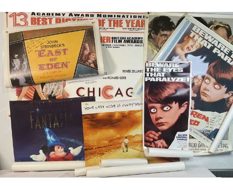 A collection of autographed original and reproduction movie posters of various sizes including CHICAGO (2002) British quad si