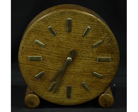 A handmade electric oak mantel clock, the circular dial with batons denoting hours. Dial measures, made by boy artificer Edmu