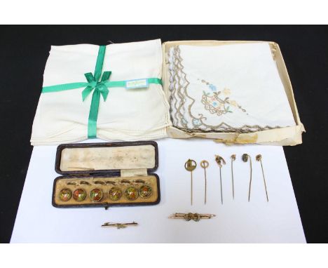 Two 9ct gold bar brooches, a collection of six gilt metal tie pins, a set of cased ceramic dress studs, and a set of handkerc