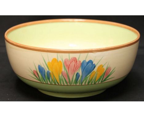 A Clarice Cliff Summer Crocus pattern bowl, painted with crocus' on a plain ground. Marked in gilt and printed A J Wilkinson 