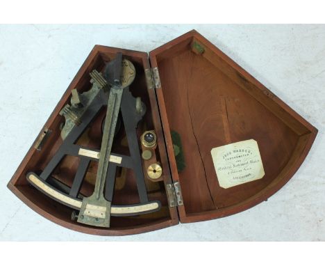 A 19th century ebonised and brass Octant instrument by Dobbie of Glasgow, with ivory scales and brass fitments, retailed by J