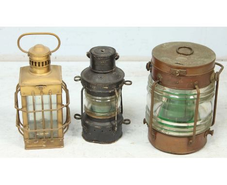 A ships Not Under Command lamp, and two hand held lanterns. (3)