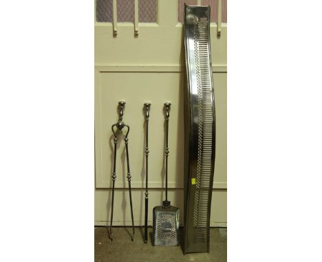A Victorian steel fire surround and a set of fire tools.