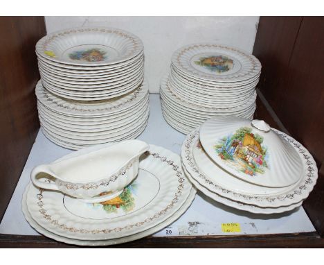 SECTION 20. A Wade porcelain dinner service, with transfer printed decoration of cottages.