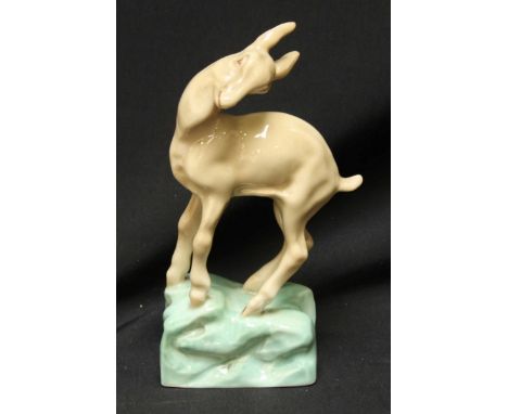A rare Wade pottery figure of a goat, 'Chamois Kid' signed Faust Lang, with printed and painted mark to base, dated 1939.
Con