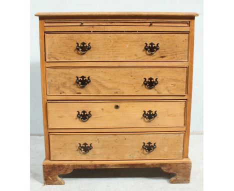 A 20th Century pine bachelor chest  with sliding writing board above four long drawers, raised on bracket feet, 74cm x 64cm.