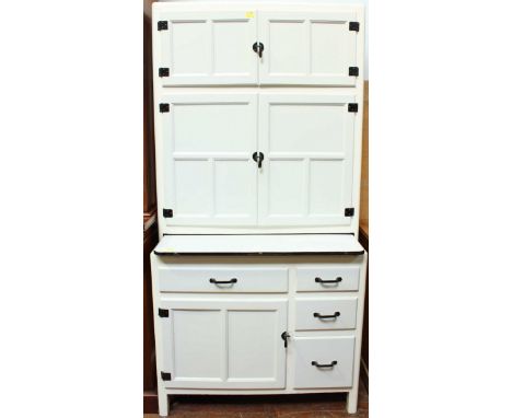 A 1950s "Maidsaver" type kitchen cupboard, incorporating five cupboards, four drawers and a sliding enamel worktop, 92cm wide
