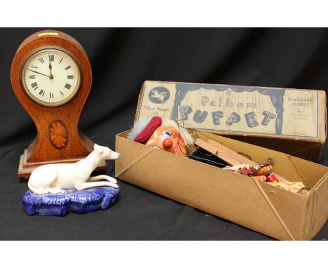 A Pelham Puppets highland dancer, together with a small Edwardian oak mantle clock and a Staffordshire pottery greyhound inkw