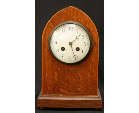 A late 19th / early 20th century mantel clock, with French eight-day movement striking a gong, white enamel dial with Arabic 