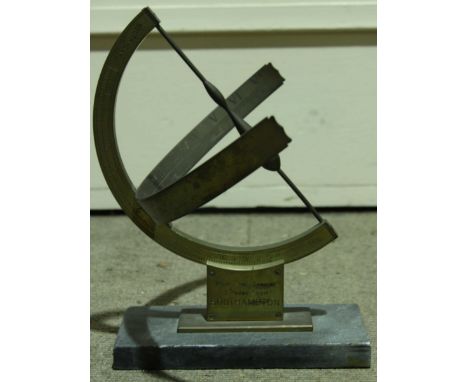 An early 20th century brass Mean Time Sundial, by J. Pound of Southampton, mounted on a  granite base.
