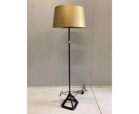 A Tom Dixon standard lamp with satin shade