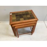 Trioh, a nest of three mid century Danish teak tile top tea tables, width 56cm, depth 41cm, height