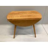 An Ercol elm drop leaf dining table, width 102cm, depth 64cm, height 71cm