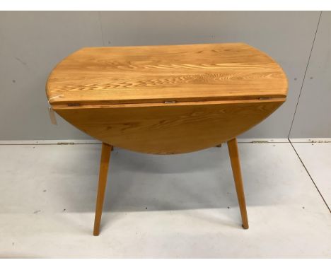 An Ercol elm drop leaf dining table, width 102cm, depth 64cm, height 71cm