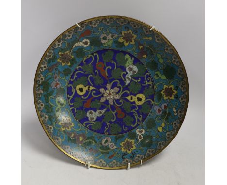 An early 19th century Chinese cloisonné enamel dish, Jiaqing-Daoguang period, 29cm One small area of underside with losses to