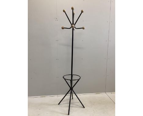 A Contemporary hat and coat stand in waxed black painted steel in the manner of Roger Feraud, c.1960, height 186cm