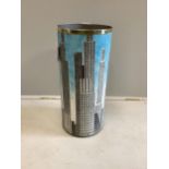 A Fornasetti Grattacieli stickstand, diameter 26cm, height 57cm