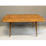 An Ercol rectangular elm dining table, width 150cm, depth 75cm, height 71cm together with six