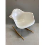 A Vitra Eames rocking chair, purchased from Skandium, width 63cm, depth 68cm, height 67cm