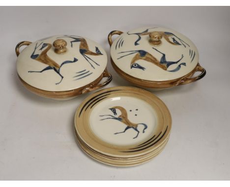 John Armstrong for Clarice Cliff, a pair of lidded two handled vegetable tureens and five dishes, painted with the ‘’Chaldean