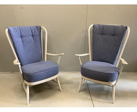 A pair of Ercol Evergreen armchairs, width 73cm, depth 60cm, height 104cm