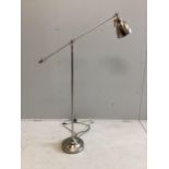 A Contemporary chrome adjustable floor lamp