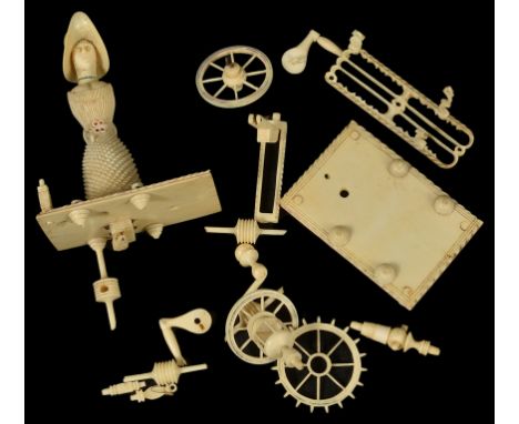 A Napoleonic Prisoner-of-War Bone Miniature Spinning Jenny Automaton, c1820:In disassembled form, the lady with moving head, 