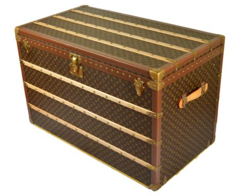 A Louis Vuitton Large Travelling Trunk:With  Louis Vuitton monogrammed livery,  wooden skids and heavy duty leather handles, 