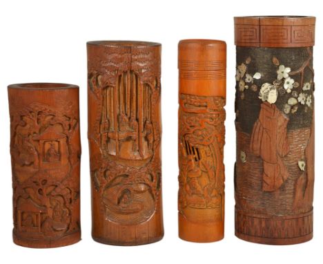 A Collection of Chinese and Japanese Bamboo Brushpots,19th century:To include: a large Chinese brushpot carved with a scene o