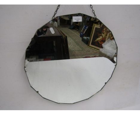 A round bevelled vintage mirror 
