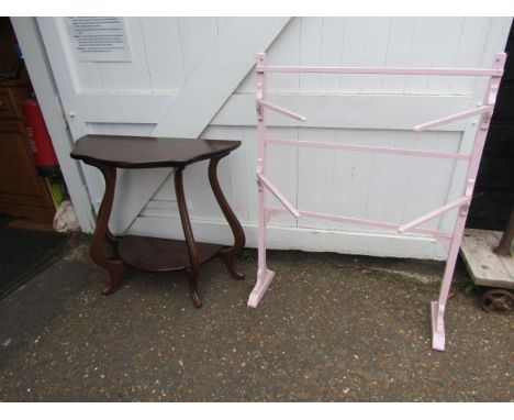 A mahogany hall table and pink vintage clothes airer