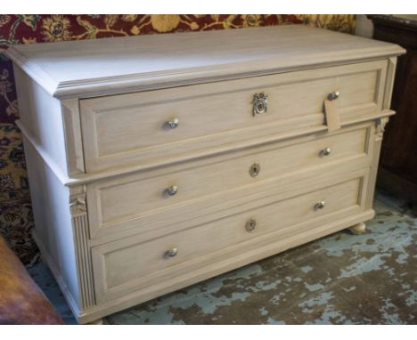COMMODE, 19th century French traditionally grey painted with three long deep storage drawers pilasters and turned front suppo