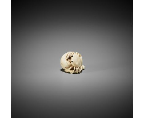 HOGEN RANTEI: AN IVORY NETSUKE OF CRAB ON PERSIMMONBy Hogen Rantei, signed Hogen RanteiJapan, Kyoto, early 19th century, Edo 