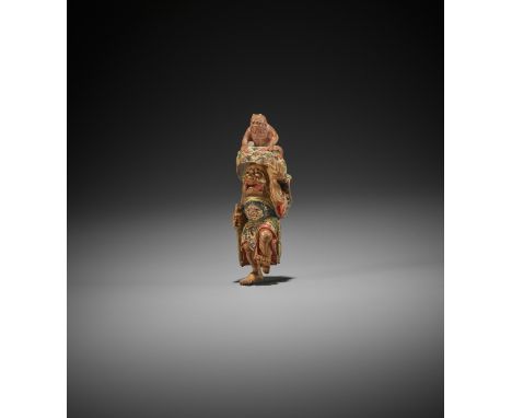 SHUKO: A RARE SAISHIKI NETSUKE OF SHOKI AND ONIBy Shuko, signed ShukoJapan, Osaka, 19th centuryShoki is standing on one foot,