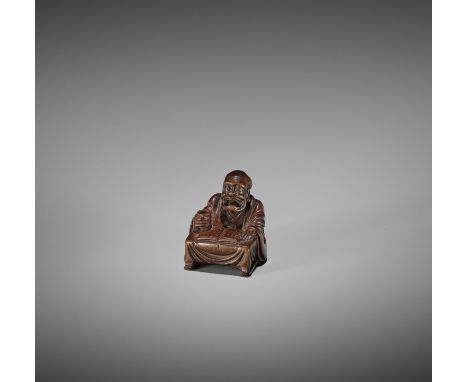 MIWA: AN EDO SCHOOL WOOD NETSUKE OF A DRUNK STORYTELLERSigned MiwaJapan, Edo, early 19th century, Edo period (1615-1868) The 