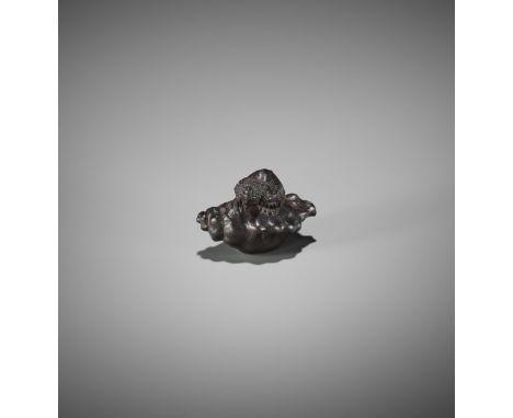 KOMIN: A DARK WOOD NETSUKE OF A KAPPA EMERGING FROM A CONCHBy Komin, signed Komin with kakihanJapan, Edo (Tokyo), mid-19th ce
