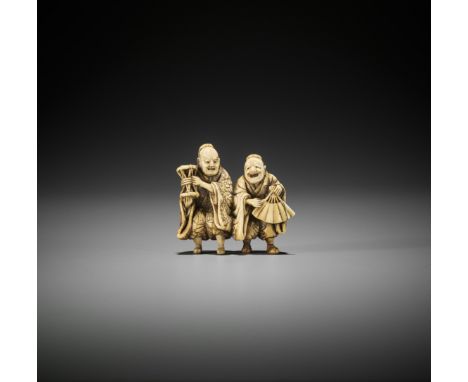 A SPIRITED IVORY NETSUKE OF TWO MANZAI DANCERSJapan, late 18th to early 19th century, Edo period (1615-1868)Carved as two per