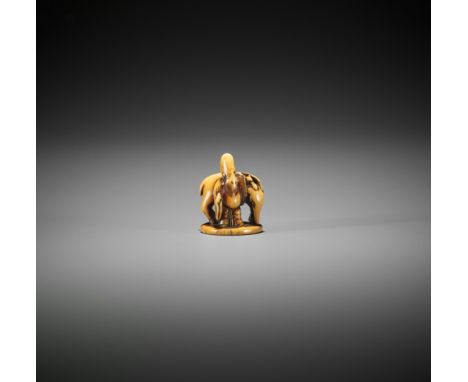 AN EARLY IVORY INGYO (SEAL) NETSUKE OF JUROJIN AND DEERJapan, second half of 17th century, Edo period (1615-1868)The lucky de