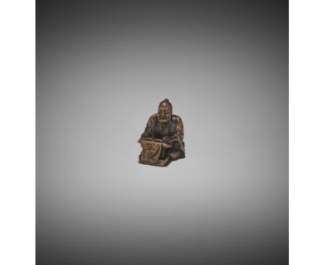 JURAKU: AN EDO SCHOOL WOOD NETSUKE OF THE STORYTELLER NUMATA JUNSAIBy Juraku, signed Juraku 寿乐Japan, Edo, 19th century, Edo p