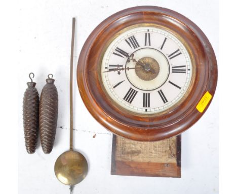 Lovejoy &amp; Co - An early 20th century walnut cased postal clock. The clock having black enamelled roman numeral to the cha