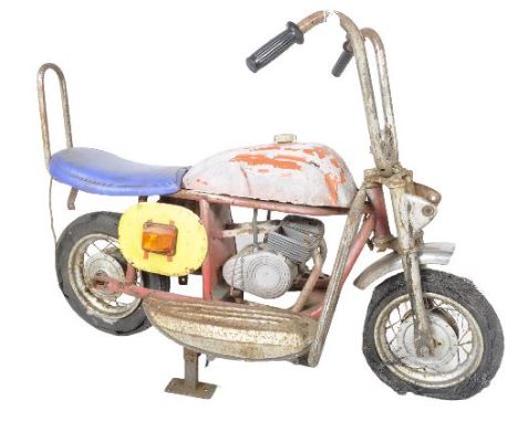 Minimotor - A vintage mid 20th Century juvenile fairground / funfair carousel ride in the form motorbike / Harley Davidson Ch