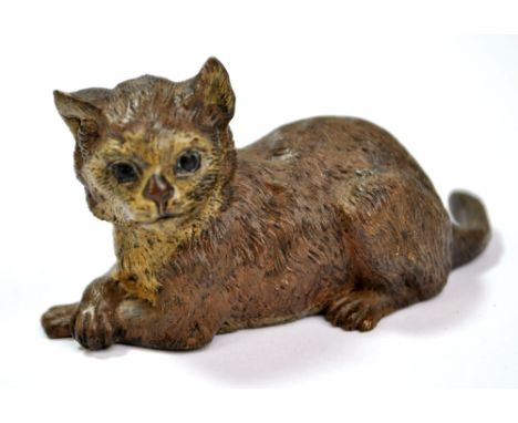 FRANZ XAVER BERGMANN; an Austrian early 20th century cold painted bronze study of a reclining cat with foundry mark to base, 