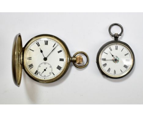 A silver crown wind half hunter pocket watch with white enamel dial set, the Roman numerals and a silver engraved key wind fo