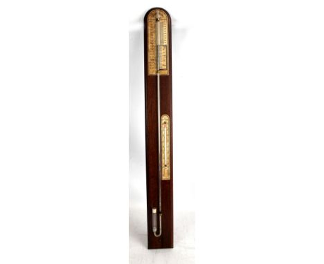 A 20th century barometer by Torricelli, with paper dial on oak panel, height 92cm.