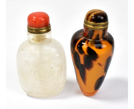 Two Chinese 20th century glass scent bottles, the first of crystal colour relief carved with robed scholar/immortal in landsc