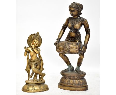 A 20th century Indian cast brass figure of Radha Krishna playing flute, on lotus base, height 65cm (flute missing), and a fur