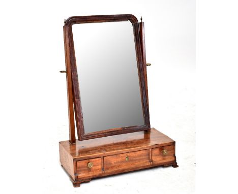 A George III and later mahogany dressing table mirror with three drawers on bracket feet, height 59cm.